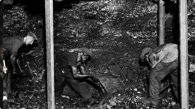 Historical miners working underground